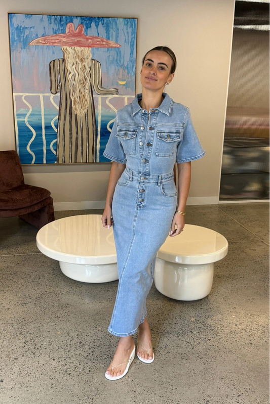 Katrina Denim Midi Dress in Light Blue Wash by Sneaky Link, stretch denim dress with cinched waist and button-up front.