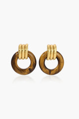 Luma Knot Earrings Gold/Tiger’s Eye by Heaven Mayhem, 18k gold PVD-plated knot earrings with natural Tiger’s Eye stone.