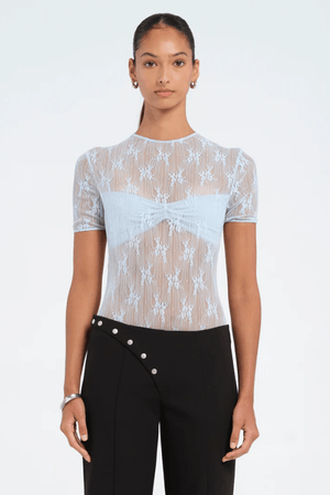 Porter Bodysuit Blue by Benni — Stretch lace bodysuit with high neck, soft jersey lining, open back with hook-and-eye closure, G-string panty, and snap crotch for sleek, practical style.