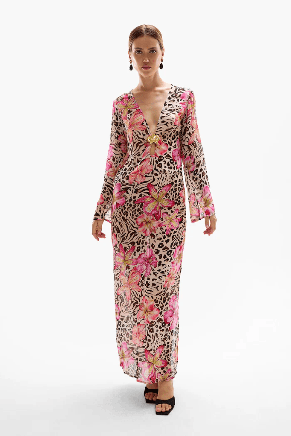 Hotline Orchid Maxi Dress Safaria by Cin Cin – Trendy and bold, this maxi features vibrant floral and animal prints, semi-sheer viscose, and a sultry keyhole bust. Perfect for beach-to-bar days and warm evenings.