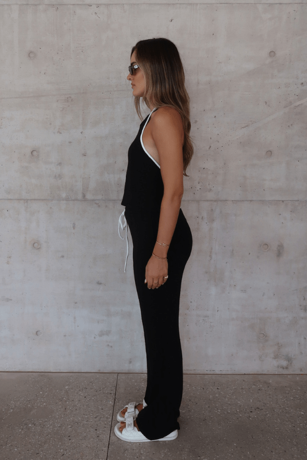 Charlie Halter Top Black/White by Sneaky Link - Trendy summer staple with chic halter neckline and open back. Perfect for beach days or viral nightlife vibes.