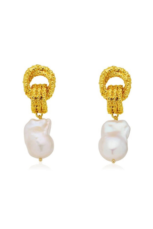 Mirage Earrings by Amber Sceats - gold statement earrings with freshwater pearls and sculptural knot detail, designed for elevated styling.