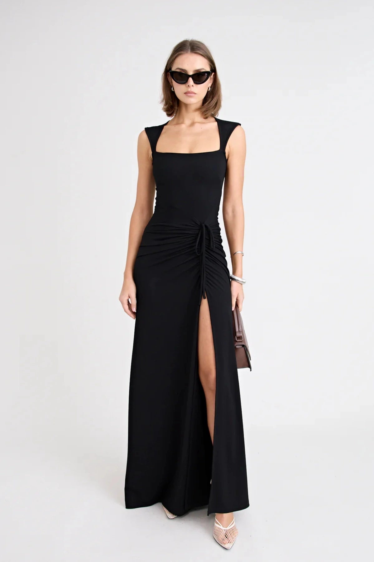 Samara Dress by Pfeiffer — a full-length jersey dress with a square neckline and adjustable front split, perfect for elegant occasions.