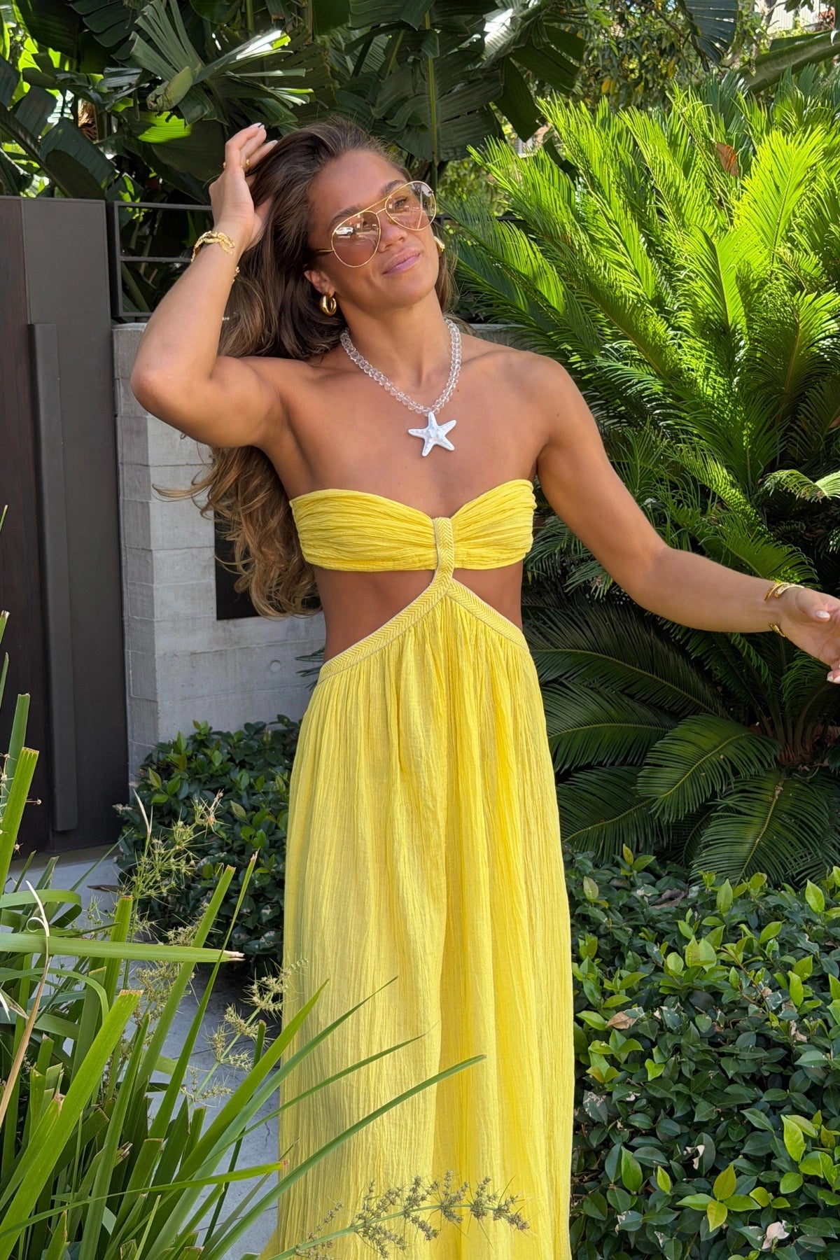 Chloe Dress Lemon by D'Artemide – Cotton strapless dress with ruched back, maxi skirt, side split, and low back detail.