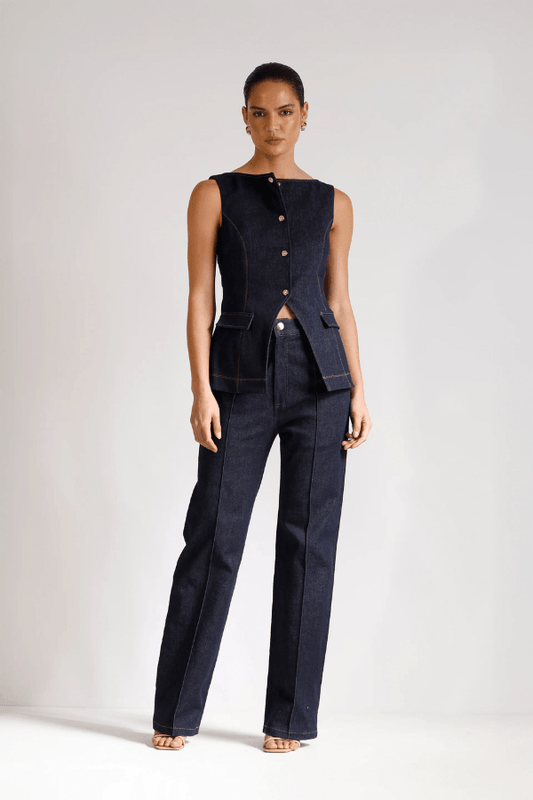 Good Vibes Top Indigo by Pasduchas – Trendy stretch denim with structured fit, gold snap studs, and mock pockets; perfect for chic, coordinated looks.