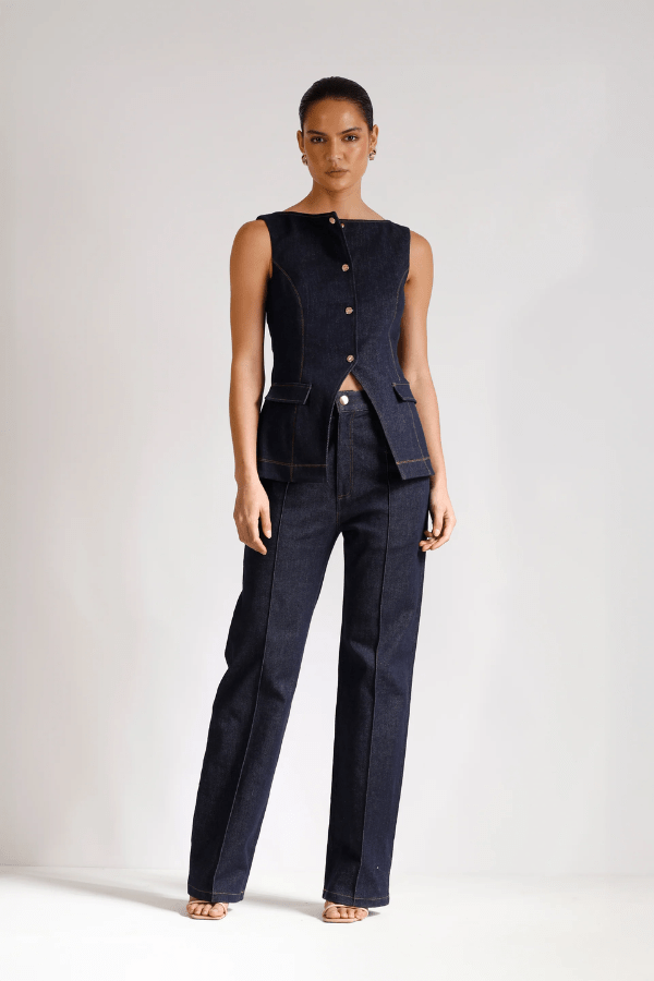 Good Vibes Top Indigo by Pasduchas – Trendy stretch denim with structured fit, gold snap studs, and mock pockets; perfect for chic, coordinated looks.