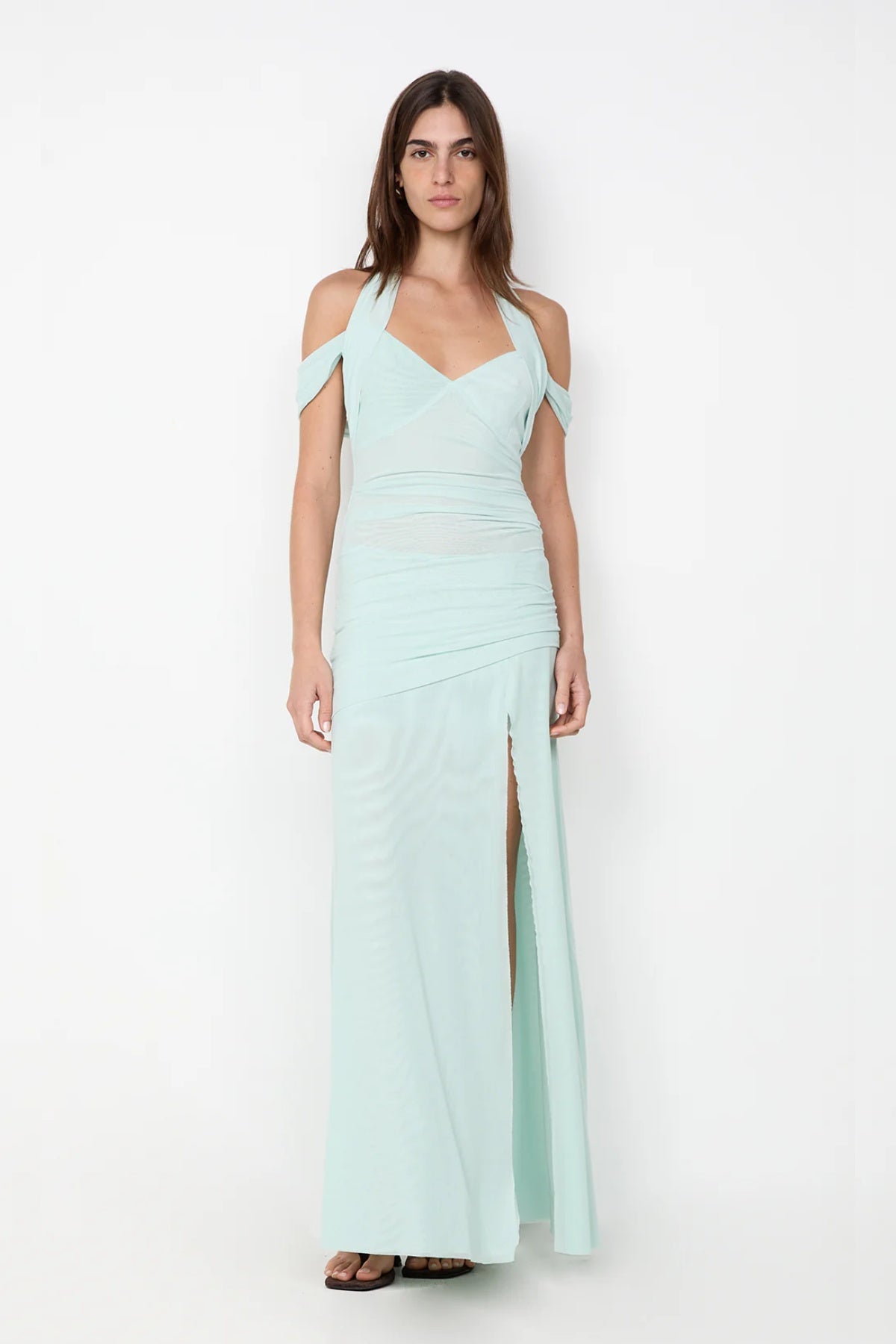 Winnie Halter Maxi Dress by Bec + Bridge, a stretch mesh gown with draped off-shoulder straps, gathered waist, and high front split for modern elegance.