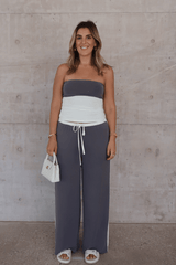 Hunter Tube Top Steel/Ivory by Sneaky Link – Sleek strapless top with contrast neckline and ruched sides. Perfect for trendy coordinated looks and viral summer vibes.