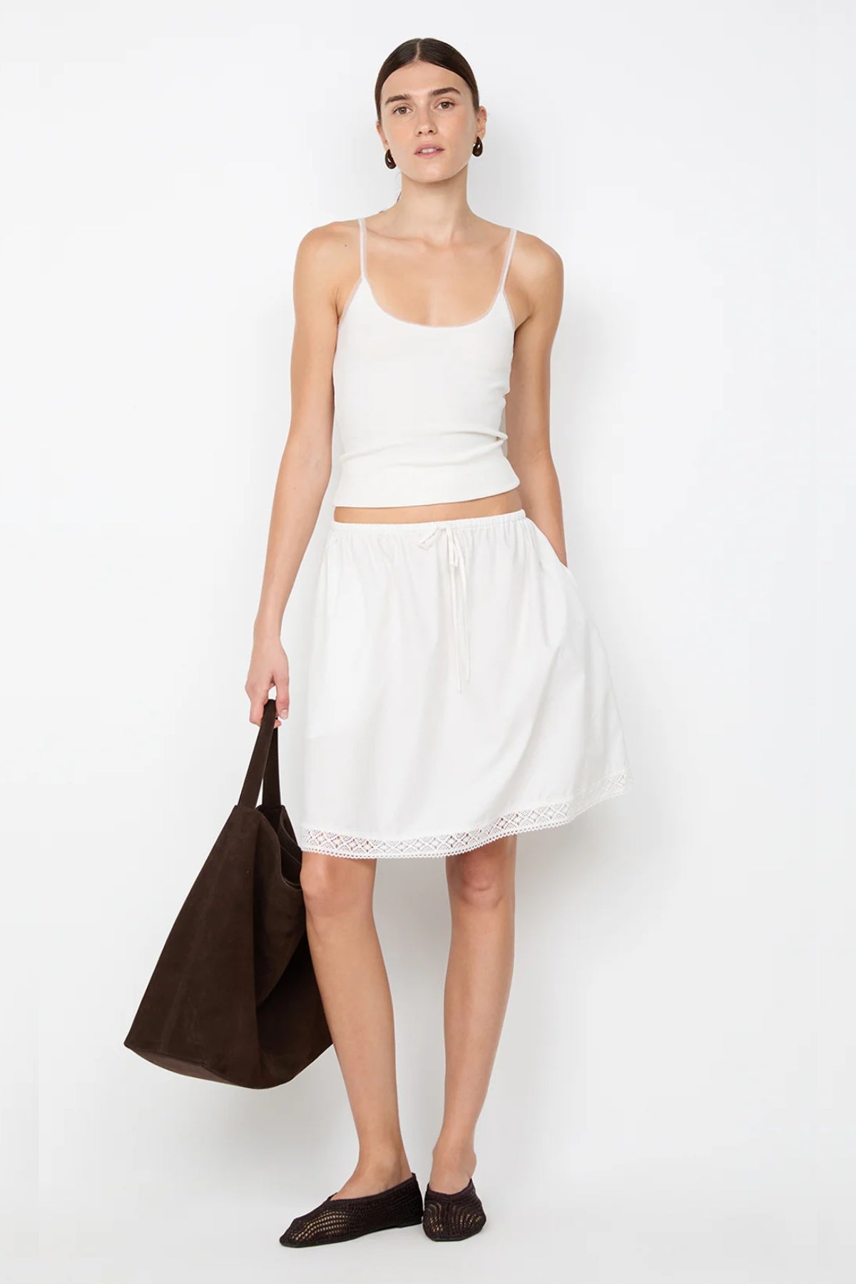 Emerson Tank in Ivory by Bec + Bridge, a ribbed cotton tank with sheer tulle trim and scoop neckline. Perfect for everyday layering or polished looks.