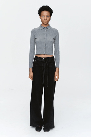 Tie Curve Seam Jean Black by Marle, trendy mid-rise jeans with unique curved seam detailing and a relaxed, wide-leg fit. Perfect for a versatile, structured look with a detachable tie belt.