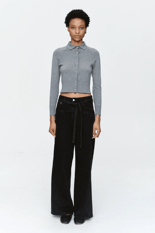 Tie Curve Seam Jean Black by Marle, trendy mid-rise jeans with unique curved seam detailing and a relaxed, wide-leg fit. Perfect for a versatile, structured look with a detachable tie belt.