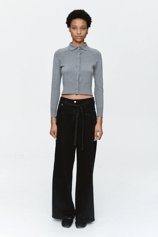 Tie Curve Seam Jean Black by Marle, trendy mid-rise jeans with unique curved seam detailing and a relaxed, wide-leg fit. Perfect for a versatile, structured look with a detachable tie belt.