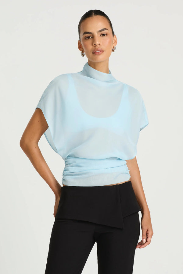 Dorothea Top in Sea Foam by Benni, a lightweight chiffon top with a draped high neckline, fitted waist, and optional bralette.