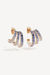 Endless Skies Hoops by By Charlotte – 18k gold plated illusion hoops with blue aquamarine and sapphire gemstones.