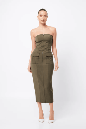 Low Profile Midi Dress Khaki by Mossman – A chic, strapless utility-inspired midi with exposed zip, front pockets, and back split, perfect for modern, versatile styling.