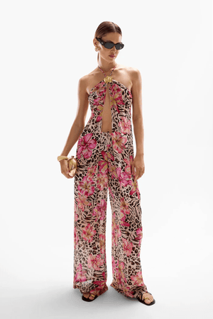 Coral Orchid Drape Top Safaria by Cin Cin – Lightweight 100% viscose with vibrant florals and animal print. Adjustable halter tie and gold clasp. Perfect for summer.