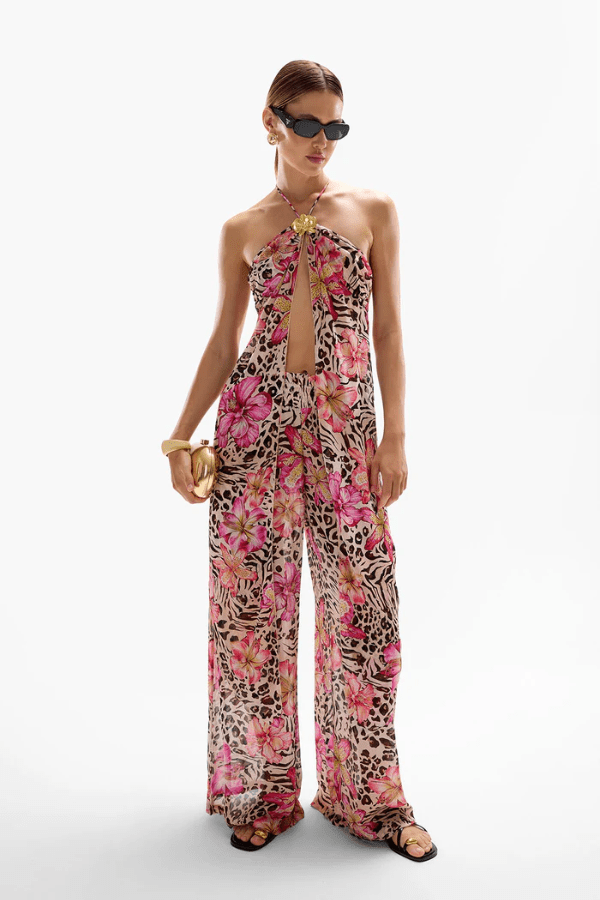 Coral Orchid Drape Top Safaria by Cin Cin – Lightweight 100% viscose with vibrant florals and animal print. Adjustable halter tie and gold clasp. Perfect for summer.