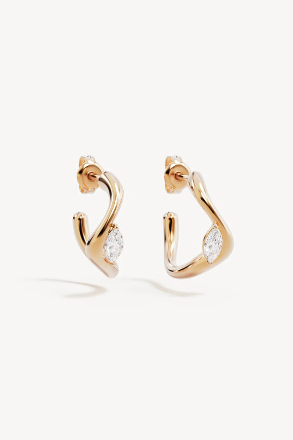 Crystal Wings Hoops by By Charlotte – 18k gold vermeil hoop earrings with marquise cubic zirconia stones.