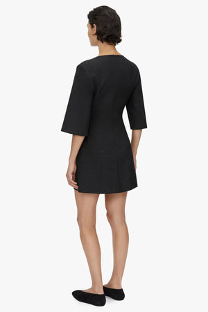 Aya Mini Dress by Camilla and Marc in black, mini tailored silhouette with bell sleeves and subtle button detailing.