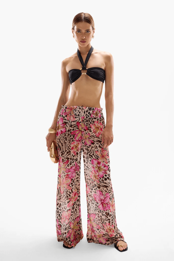 Mission Pants Safaria by Cin Cin, wide-leg pants in vibrant ‘Safaria’ print with a shirred elastic waistband. Lightweight 100% viscose, perfect for resort and summer wear.