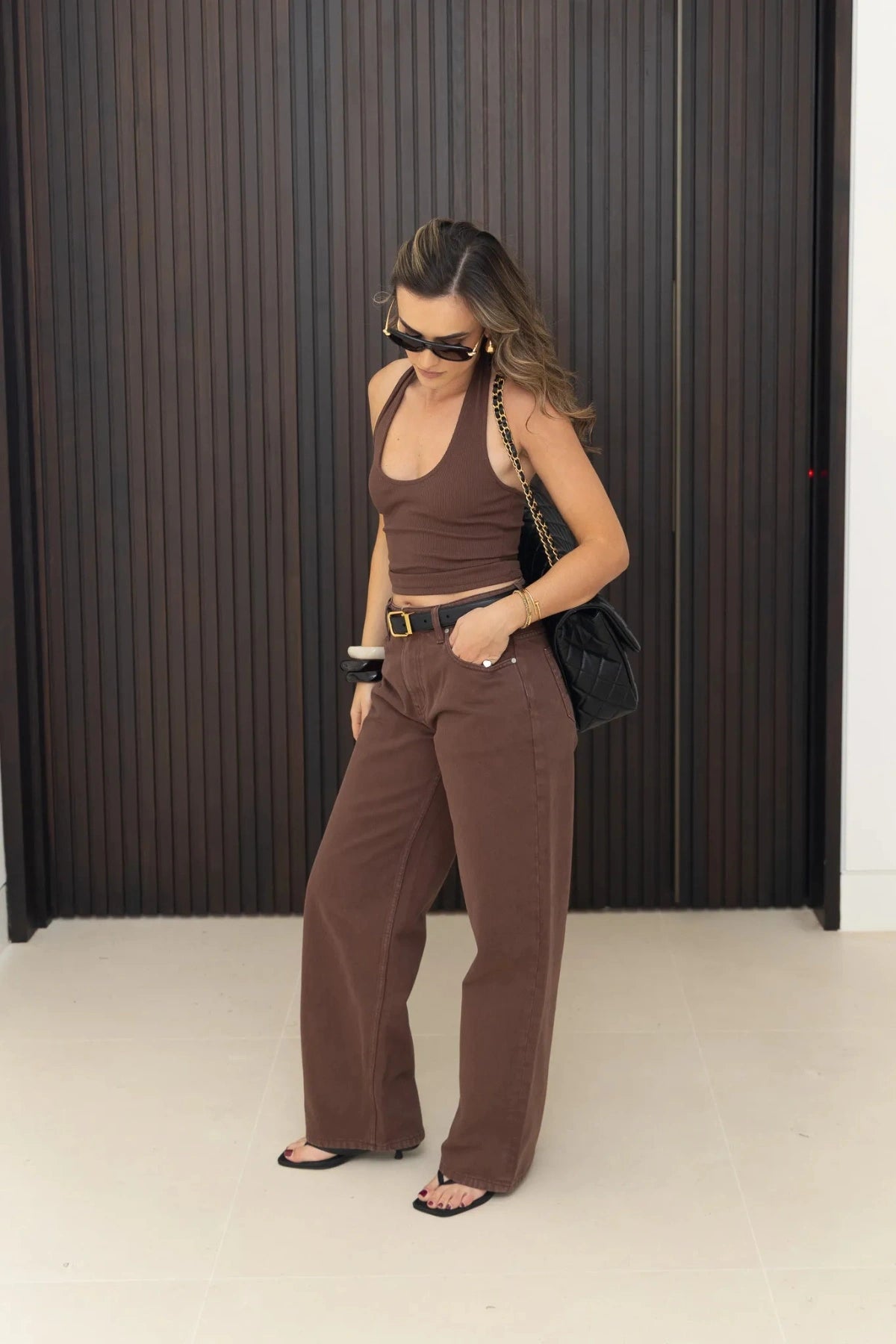 Jaz Hand Halter Tank Chocolate by Sneaky Link, a sculpted halter silhouette with stretch cotton fit. Perfect for everyday summer layering.
