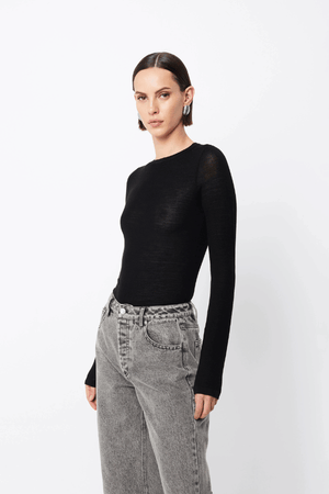 Maine Long Sleeve Top Black by Mossman – A viral, lightweight Merino wool essential with a sleek round neck and body-skimming fit, perfect for year-round layering or solo wear.