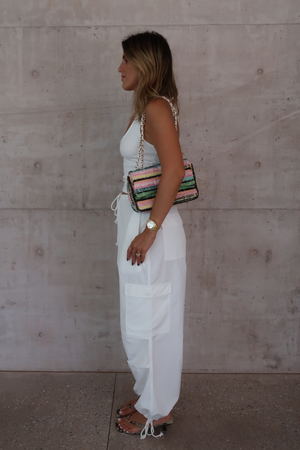 Cargo Link Pants White by Sneaky Link, versatile low-rise cargo pants with adjustable waist and hem ties for a laid-back or cuffed streetwear look.