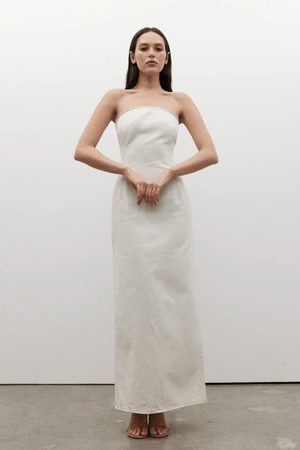 Amiri Denim Dress Angora by Bayse, a trendy, strapless denim dress with a corset-style bodice that sculpts your figure. Perfect for chic day-to-night looks.