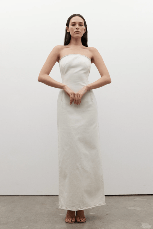 Amiri Denim Dress Angora by Bayse, a trendy, strapless denim dress with a corset-style bodice that sculpts your figure. Perfect for chic day-to-night looks.