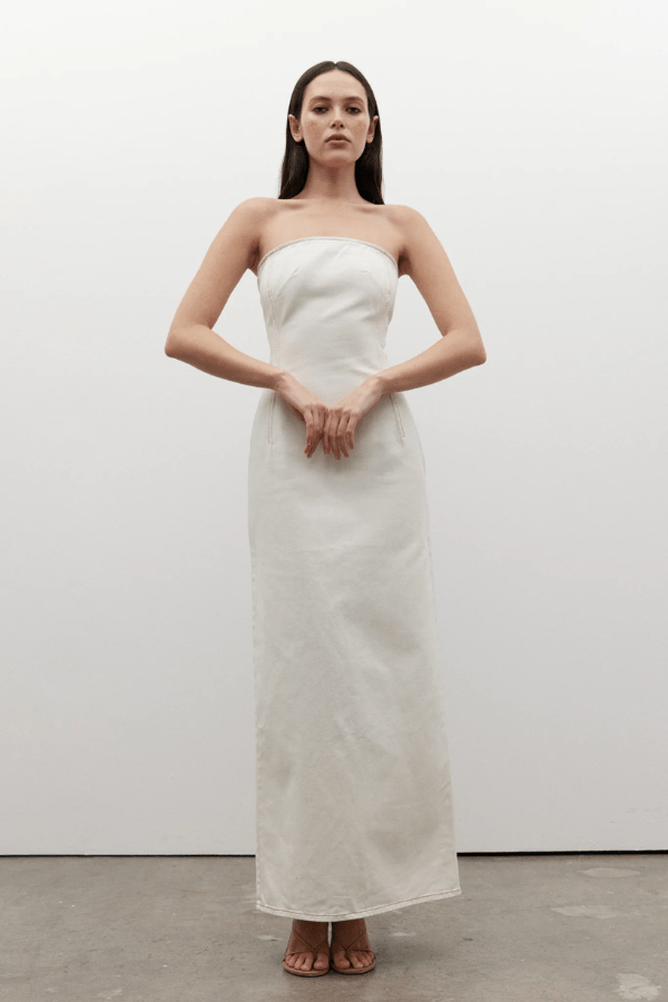 Amiri Denim Dress Angora by Bayse, a trendy, strapless denim dress with a corset-style bodice that sculpts your figure. Perfect for chic day-to-night looks.