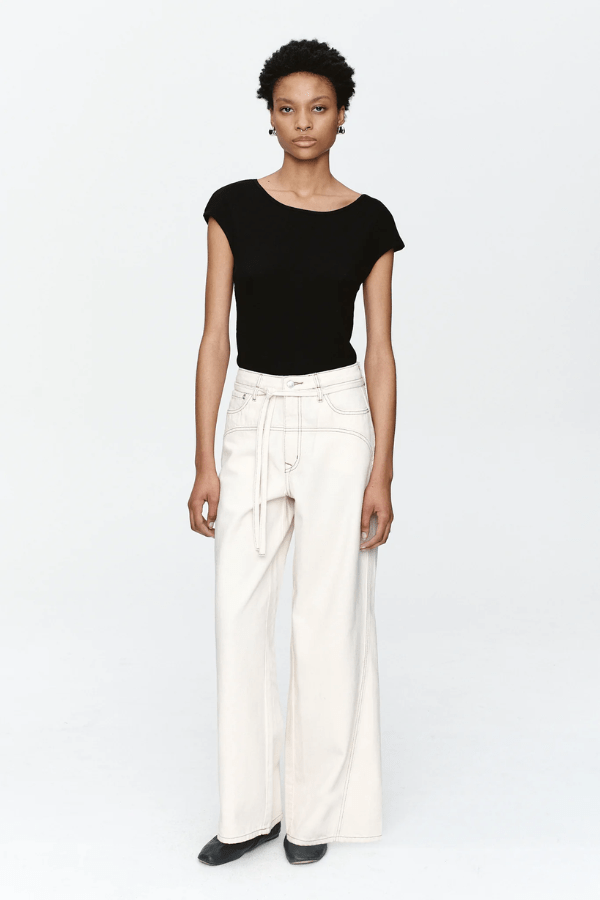 Tie Curve Seam Jean Ecru by Marle, trendy mid-rise jeans with unique curved seam detailing and a relaxed, wide-leg fit. Perfect for a versatile, structured look with a detachable tie belt.