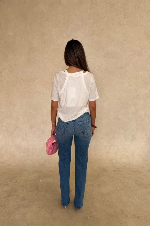 The Kick It Fan Favorite by MOTHER, trendy high-rise straight-leg jeans with a clean hem. Perfect for everyday wear with a mid-blue wash, subtle whiskering, and soft stretch denim for all-day comfort.