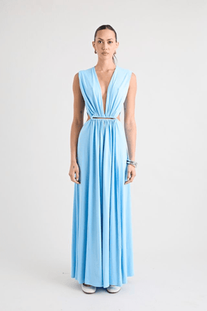 Do For Love Gown Light Blue by Pfeiffer – A trendy, elegant maxi with a deep plunge, thigh-high split, and bold hardware, perfect for special occasions and evening events.