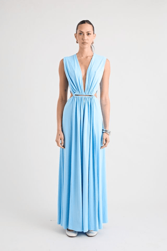 Do For Love Gown Light Blue by Pfeiffer – A trendy, elegant maxi with a deep plunge, thigh-high split, and bold hardware, perfect for special occasions and evening events.