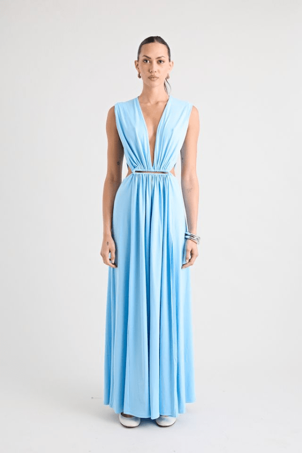 Do For Love Gown Light Blue by Pfeiffer – A trendy, elegant maxi with a deep plunge, thigh-high split, and bold hardware, perfect for special occasions and evening events.