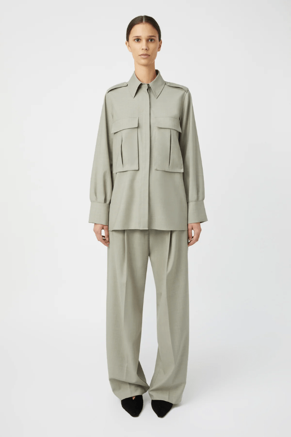 Drew Shirt Mottled Stone by Camilla and Marc – Oversized boxy shirt with 3D utility pockets, shoulder epaulettes with branded buttons, and concealed button placket. Crafted in soft wool-poly blend.
