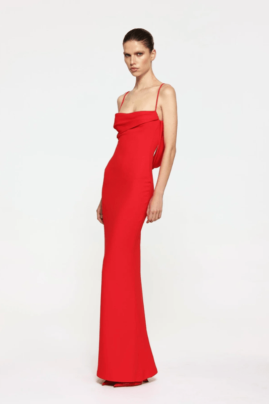 Havilland Gown Cherry Red by Effie Kats – A trendy, fitted gown with delicate ruching and a draped low back, crafted from stretch crepe for elegant special occasions.