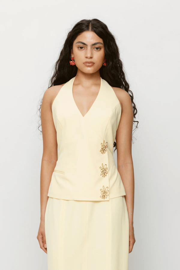 Inka Vest Top Aqua by The Wolf Gang, a halter crop with custom hardware and asymmetric closure. Perfect for sets or sleek solo styling.