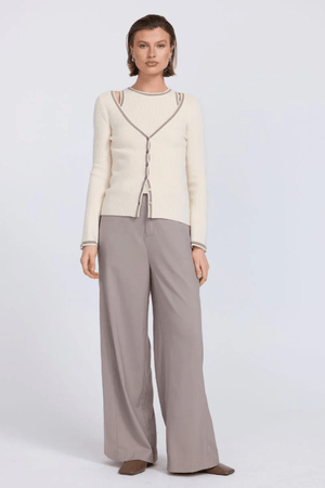 Aimee Combo Contrast Cardi Cream by Sovere – Two-piece knit set with a fitted racer tank and coordinating wide V-neck cardigan with button closure. Soft viscose blend, model wears size 8.