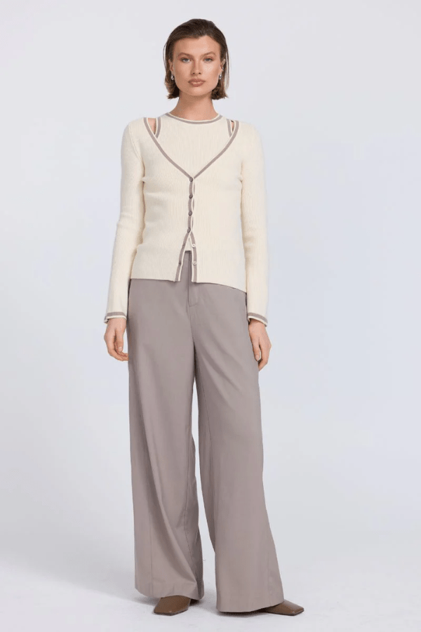 Aimee Combo Contrast Cardi Cream by Sovere – Two-piece knit set with a fitted racer tank and coordinating wide V-neck cardigan with button closure. Soft viscose blend, model wears size 8.