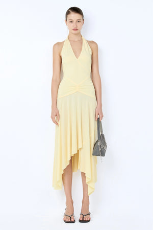 Nessie Halter Dress by Bec + Bridge in yellow stretch jersey with halter neckline, low back, and asymmetric midi hem.