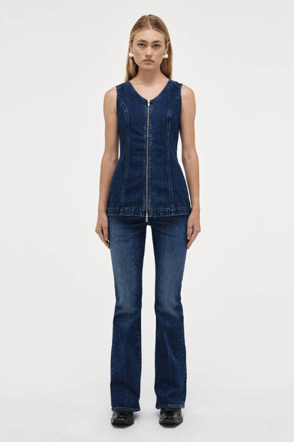 Milla Zip Tunic Dark Indigo by Neuw Denim, trendy slim-fit denim vest with a double-ended zipper for adjustable styling. Perfect for a modern or '70s-inspired look, crafted from rigid denim that molds to your body over time.