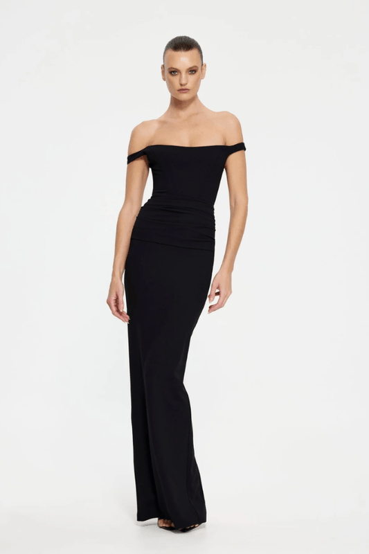 Hayward Gown Black by Effie Kats – An off-shoulder stretch-crepe gown with all-over ruching and a back split, perfect for black-tie events, red carpet moments, or evening galas.