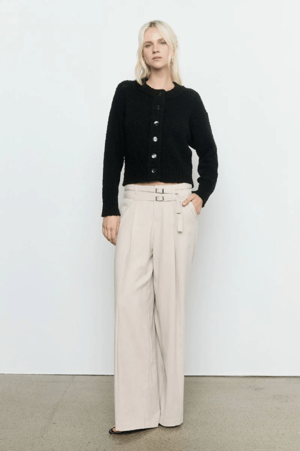 Allure Cardigan Black by Sovere Studio – Breathable 100% cotton knit with crew neck, button front, dropped shoulders, and ribbed details. Relaxed fit, perfect for layering.