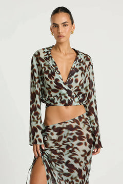Leni Wrap Top in Motion Floral by Benni, a sheer chiffon wrap top with deep V neckline, wide sleeves, and adjustable waist tie.
