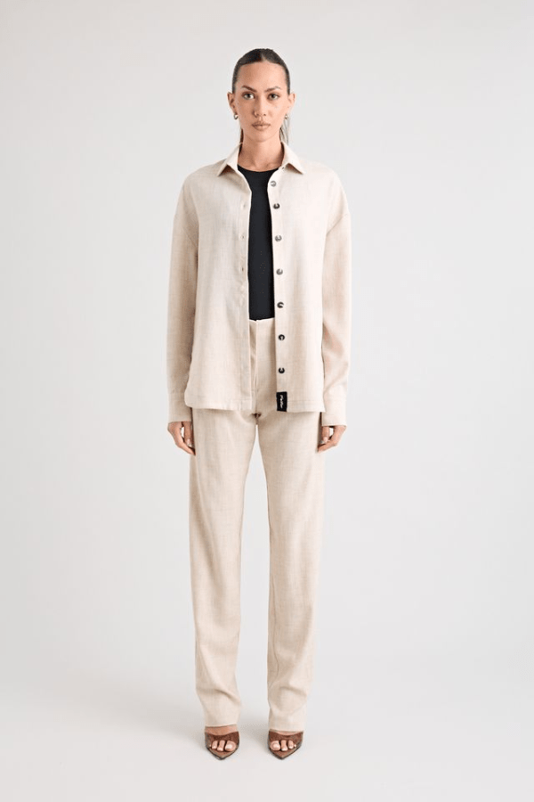 Pino Trouser natural by Pfeiffer, mid-rise tailored pants with front pleats and side pockets, perfect for day-to-night wear and office to evening events.