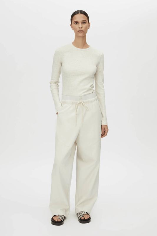 Cella Monogram Elastic Pant White by Camilla and Marc, relaxed mid-rise pants with monogram waistband, slant pockets, and panel detailing.