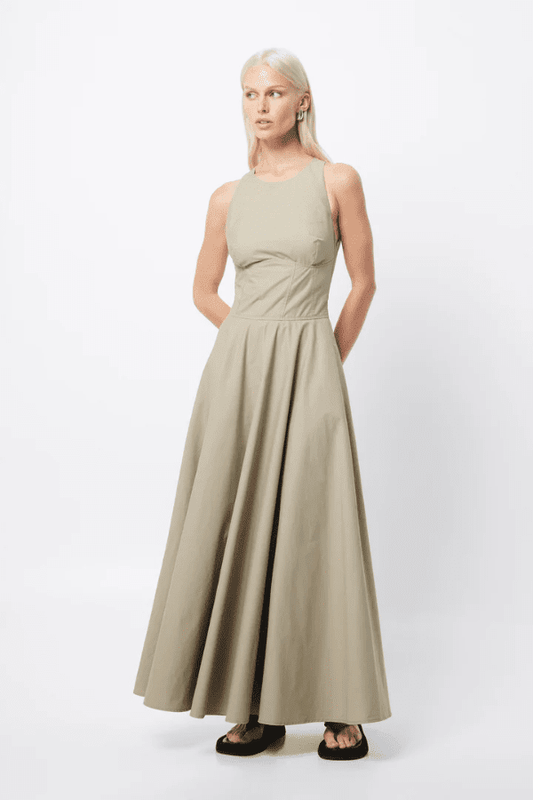 Homage Maxi Dress Eucalyptus by Mossman – A trendy, breathable cotton maxi with a flattering A-line flare and sleek design, perfect for stylish warm-weather days.