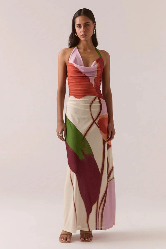 Kalea Dress – Botanic by Sovere, mesh halter-neck maxi with exclusive print and cowl neckline. Perfect for summer events.