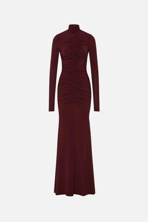 The Gathered Long Sleeve Maxi Dress by MISHA, ruched jersey maxi with mock neck and flared hem for sculpted evening styling.